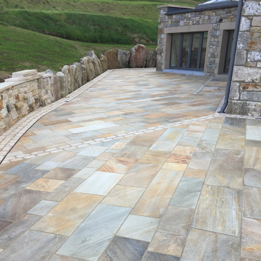 Large patio area finished in Donegal Quartzite Sawn Paving. 