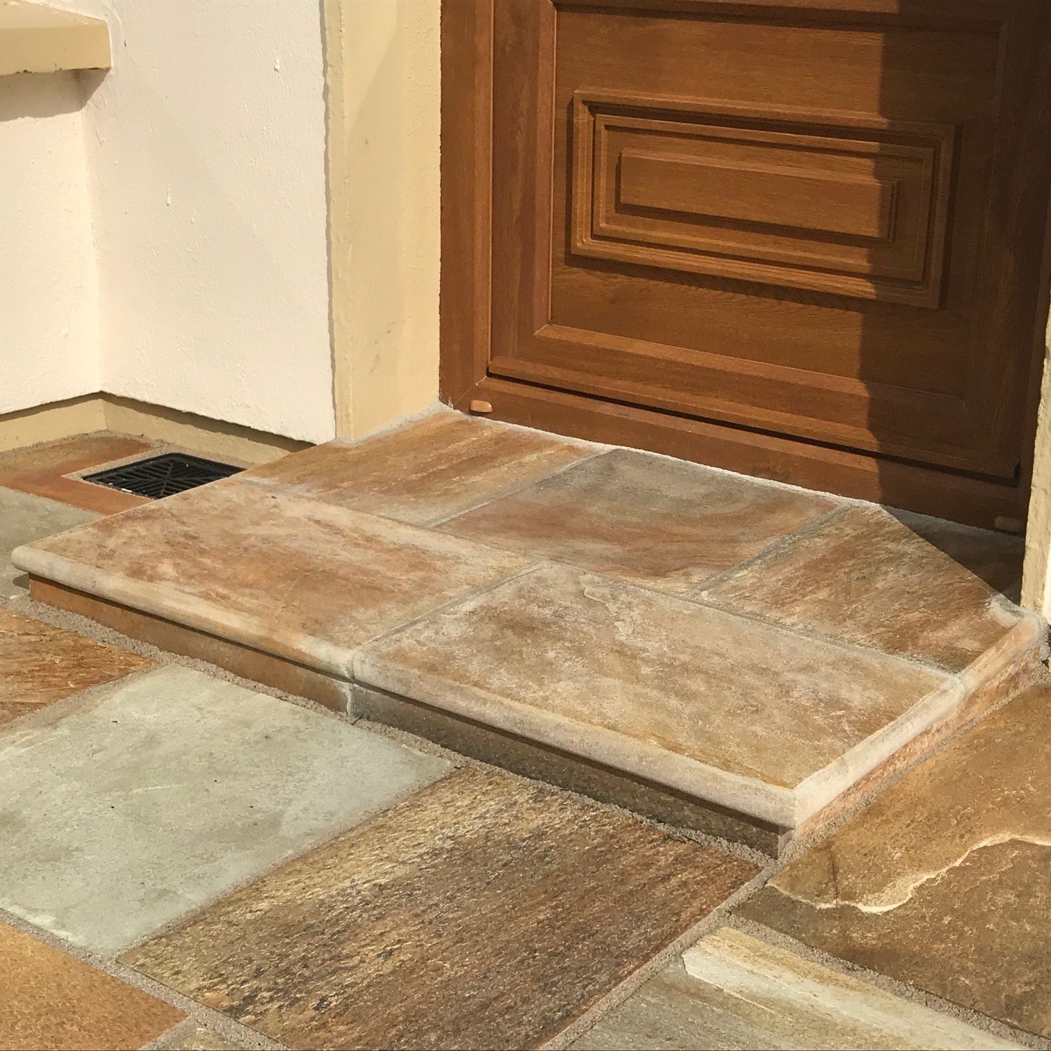 Back door step completed with Donegal Quartzite Step with bullnose edges. 