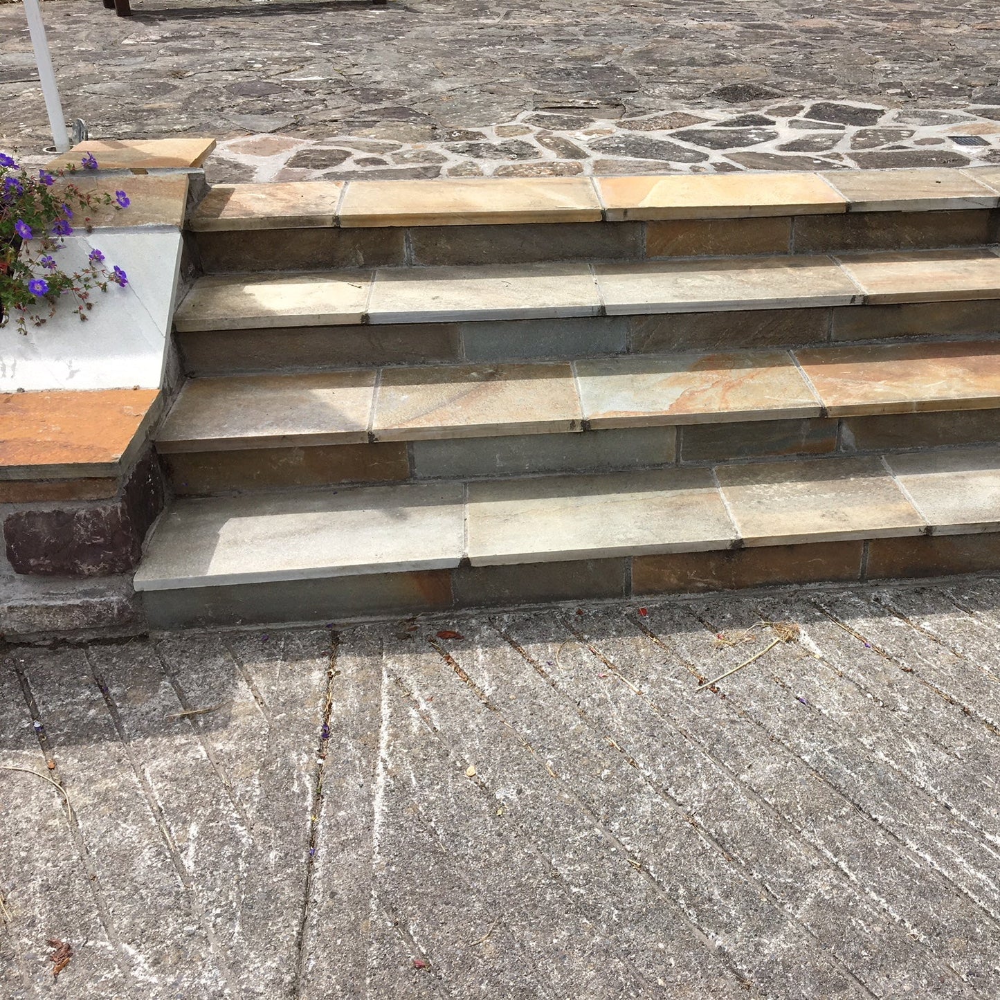 Bespoke Donegal Quartzite Steps completed in a public area. 