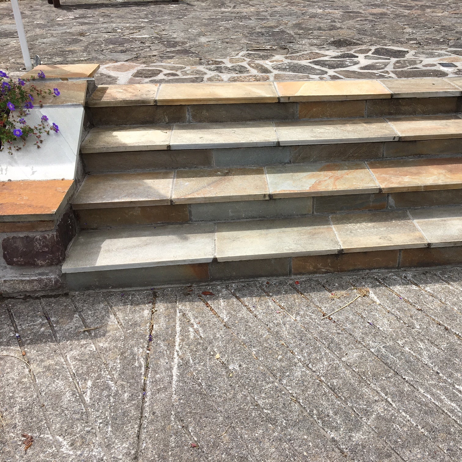 Bespoke Donegal Quartzite Steps completed in a public area. 