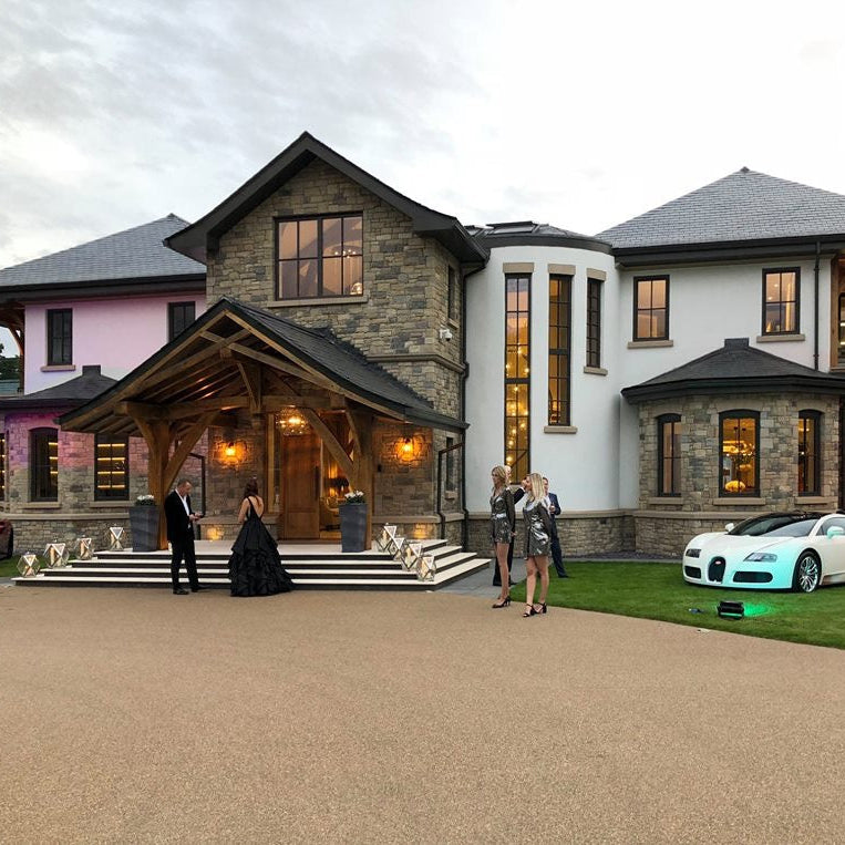 Contemporary house with Dunhill Blend Sandstone Machined stonework.