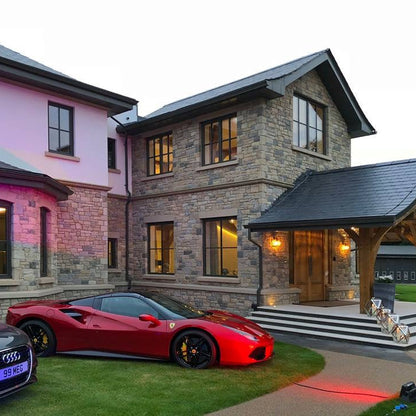 Luxurious property completed in Dunhill Blend Sandstone Machined walling stone. 