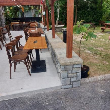 Low wall cladded in Dust Grey Sandstone Stoneer Cladding.