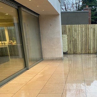 Patio area featuring Egyptian Limestone Paving in 900 x 600mm size. 