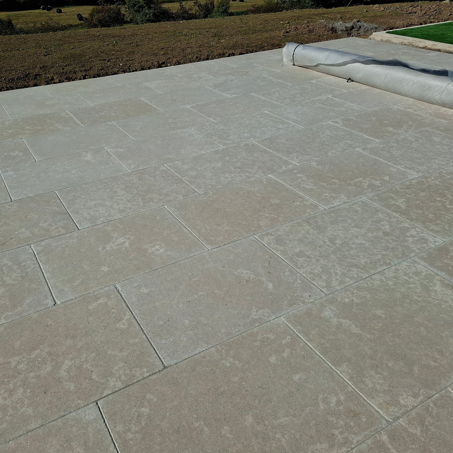 Paved patio area featuring Egyptian Limestone paving. 