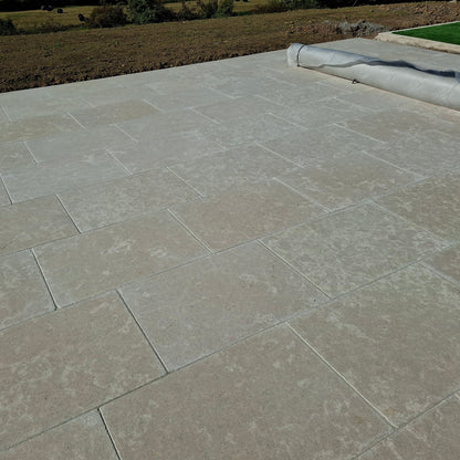Paved patio area featuring Egyptian Limestone paving. 