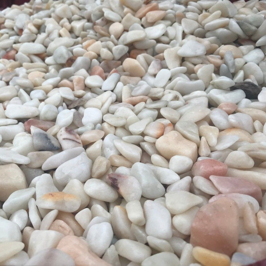 A close up of small rounded Flamingo Pebbles. 