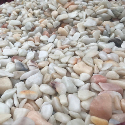A close up of small rounded Flamingo Pebbles. 