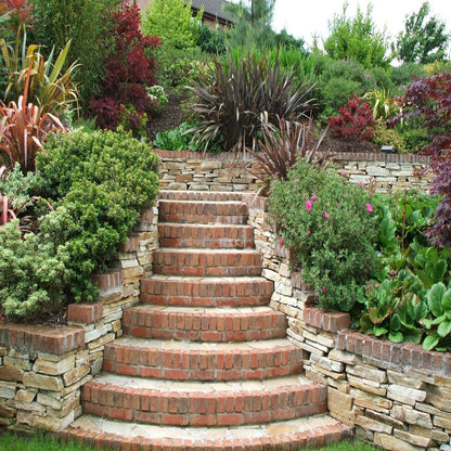 Garden wall completed using our Gold Donegal Quartzite Garden Walling in rugged from. 