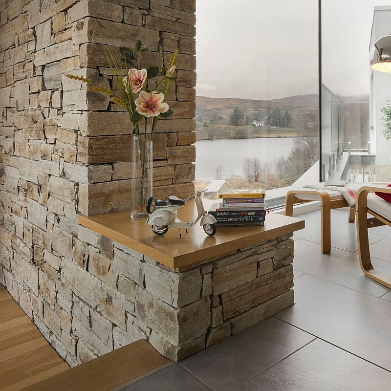 Internal stone wall featuring our Gold Donegal Quartzite Machined walling stone. 