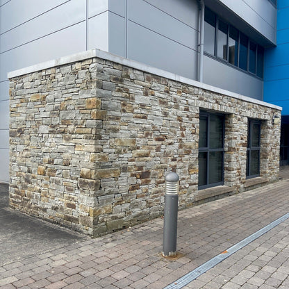 Commercial building featuring Gold Donegal Quartzite Machined.