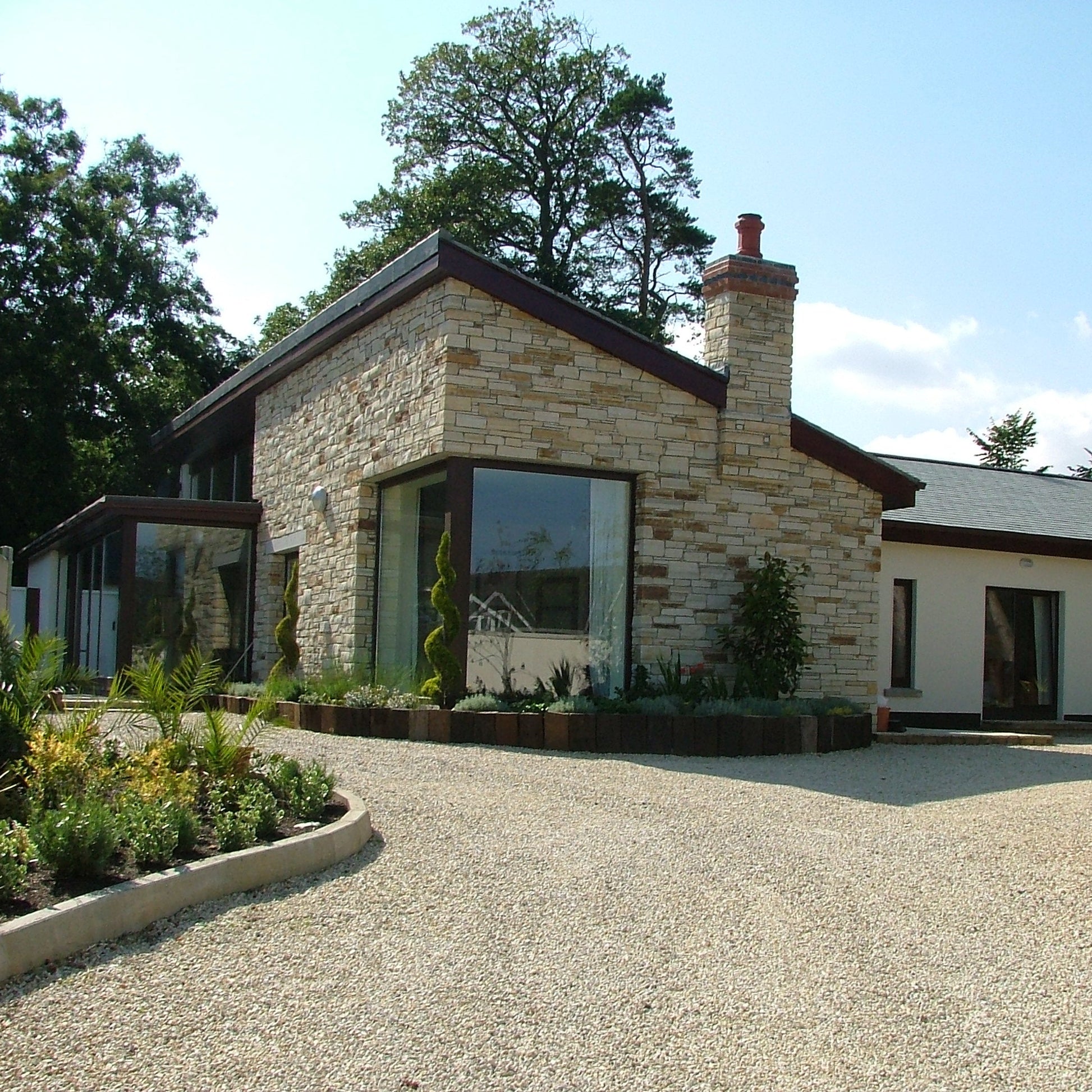 Gold Donegal Quartzite Machined on external house façade. 