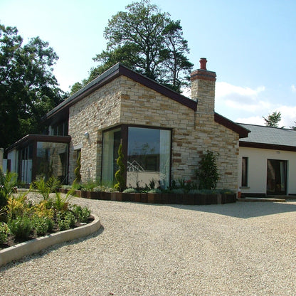 Gold Donegal Quartzite Machined on external house façade. 