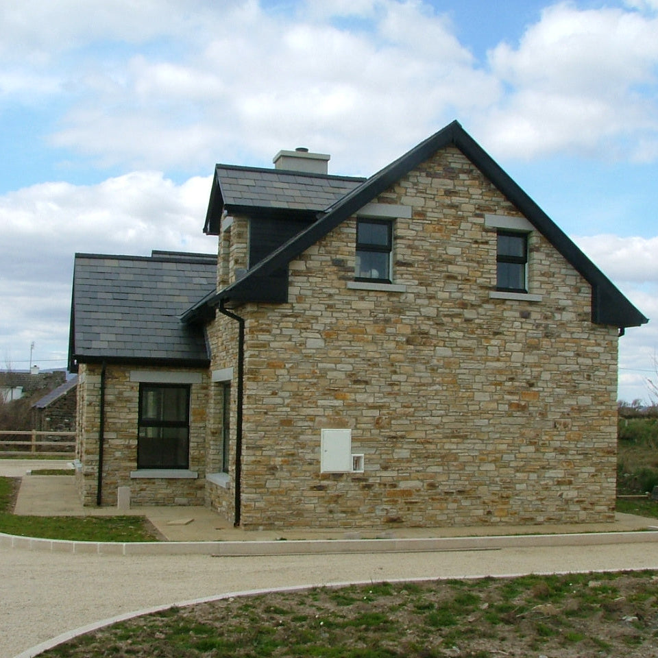 House completed using Gold Donegal Quartzite Random Rubble walling stone. 