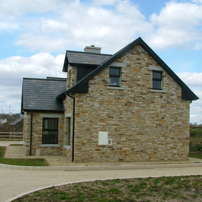 House completed using Gold Donegal Quartzite Random Rubble walling stone. 