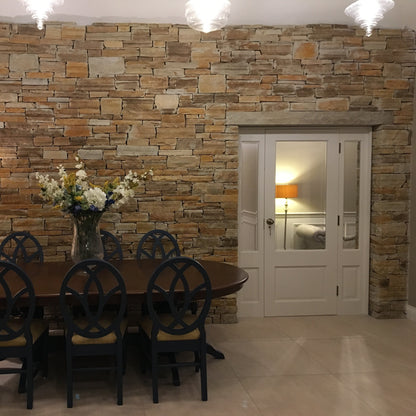 Internal stone feature wall in Gold Donegal Quartzite Stoneer Cladding.