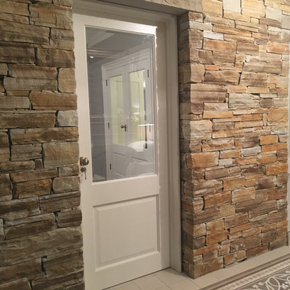 Internal stone wall completed using using 30mm Gold Donegal Quartzite Stoneer Cladding.