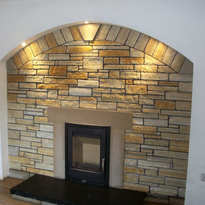Stone fireplace finished in 30mm Gold Donegal Quartzite and Sandstone Surround. 