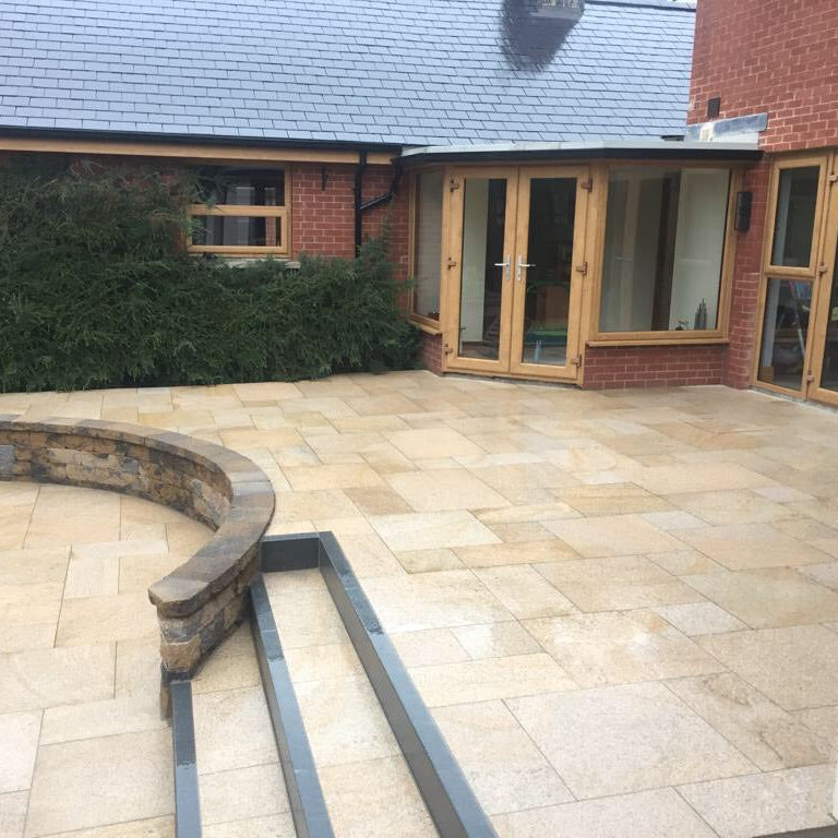 Patio completed using Gold Granite Paving in mixed sizes. 