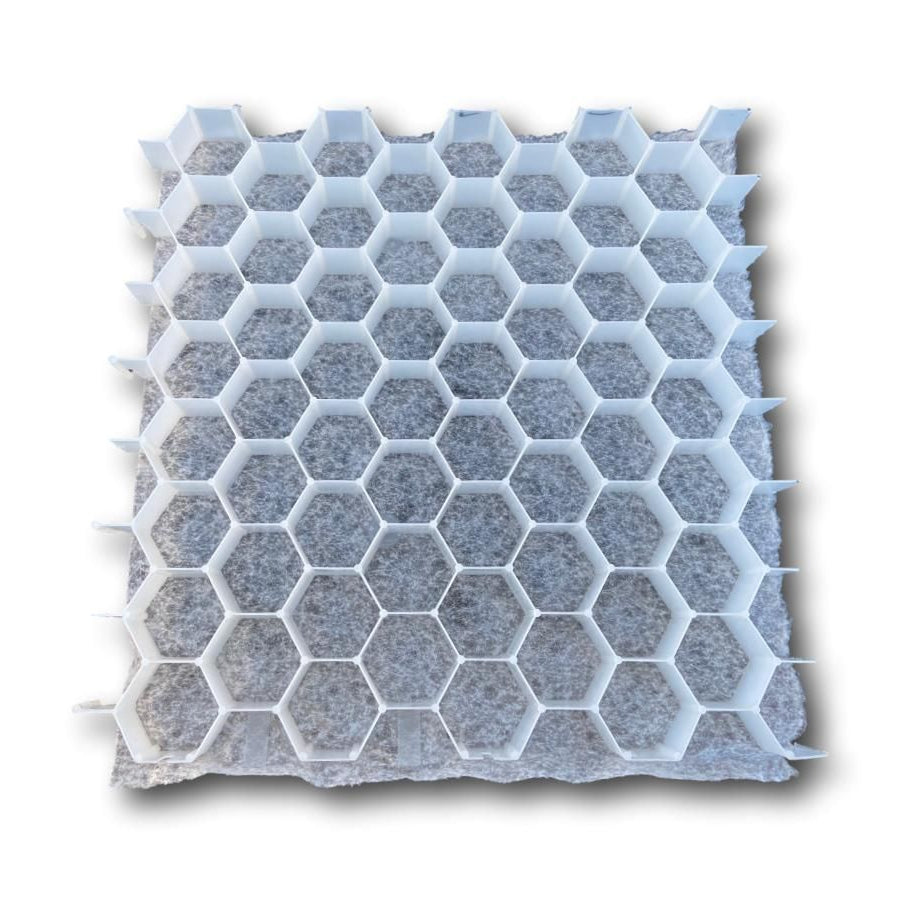 A white gravel stabilisation grid with a honeycomb structure, made from recycled plastic material.