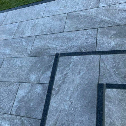 Close up of Grey Twice Qz Range Porcelain Paving Tiles. 