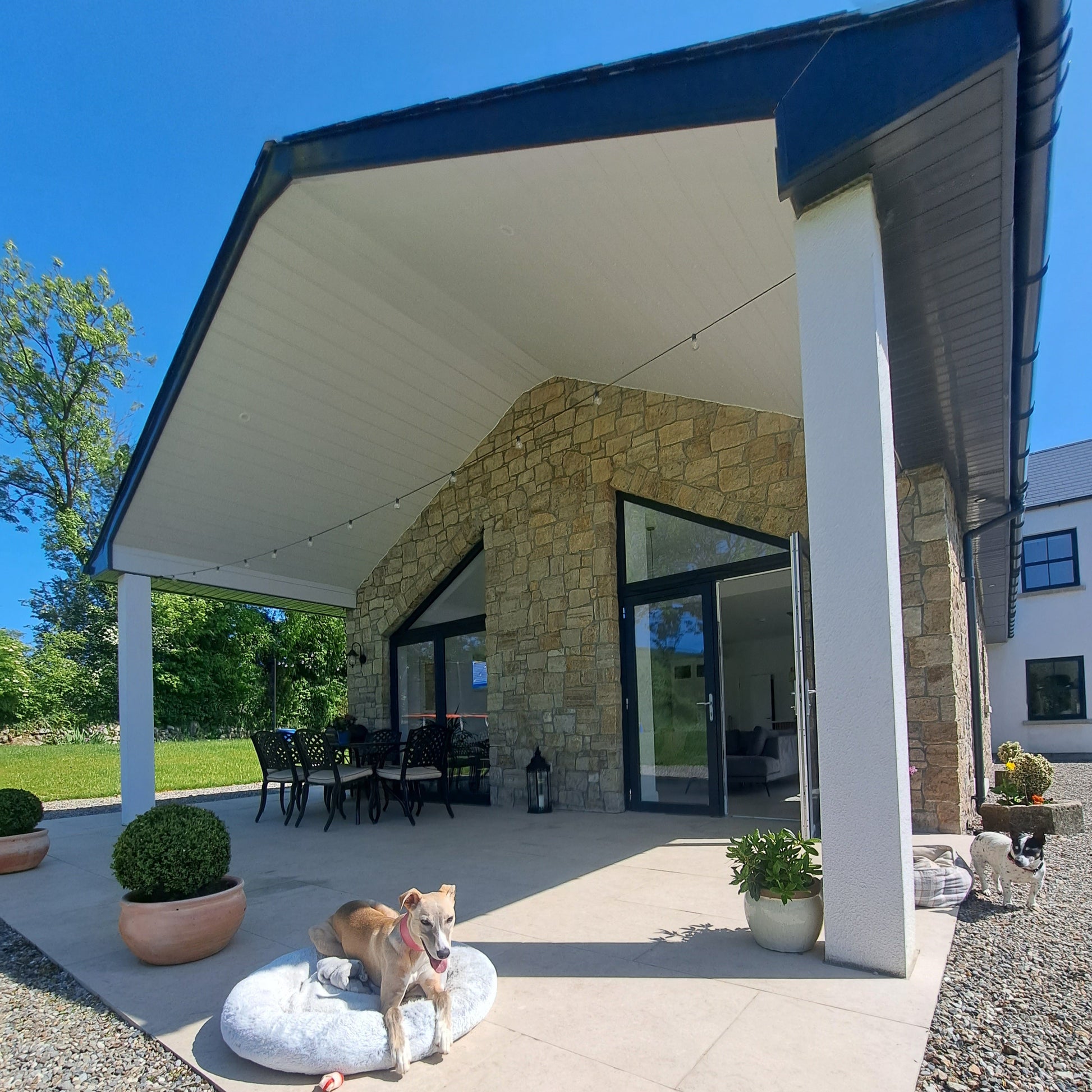 New build house with stone façade completed in Grit Sandstone Stoneer Cladding.
