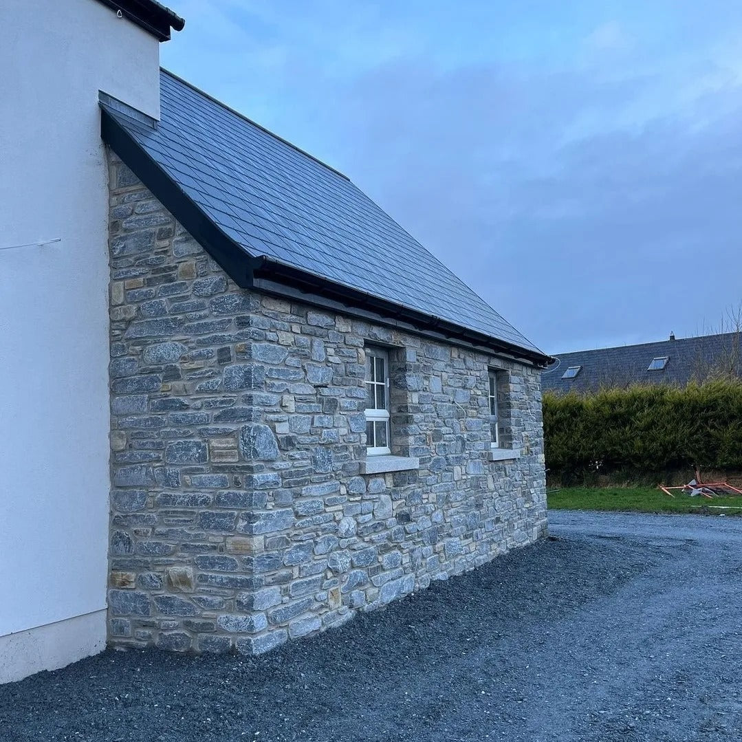 New build with stone façade in Highland Blend Tumbled.