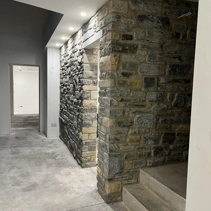 Internal stone feature wall in highland blend tumbled walling stone. 