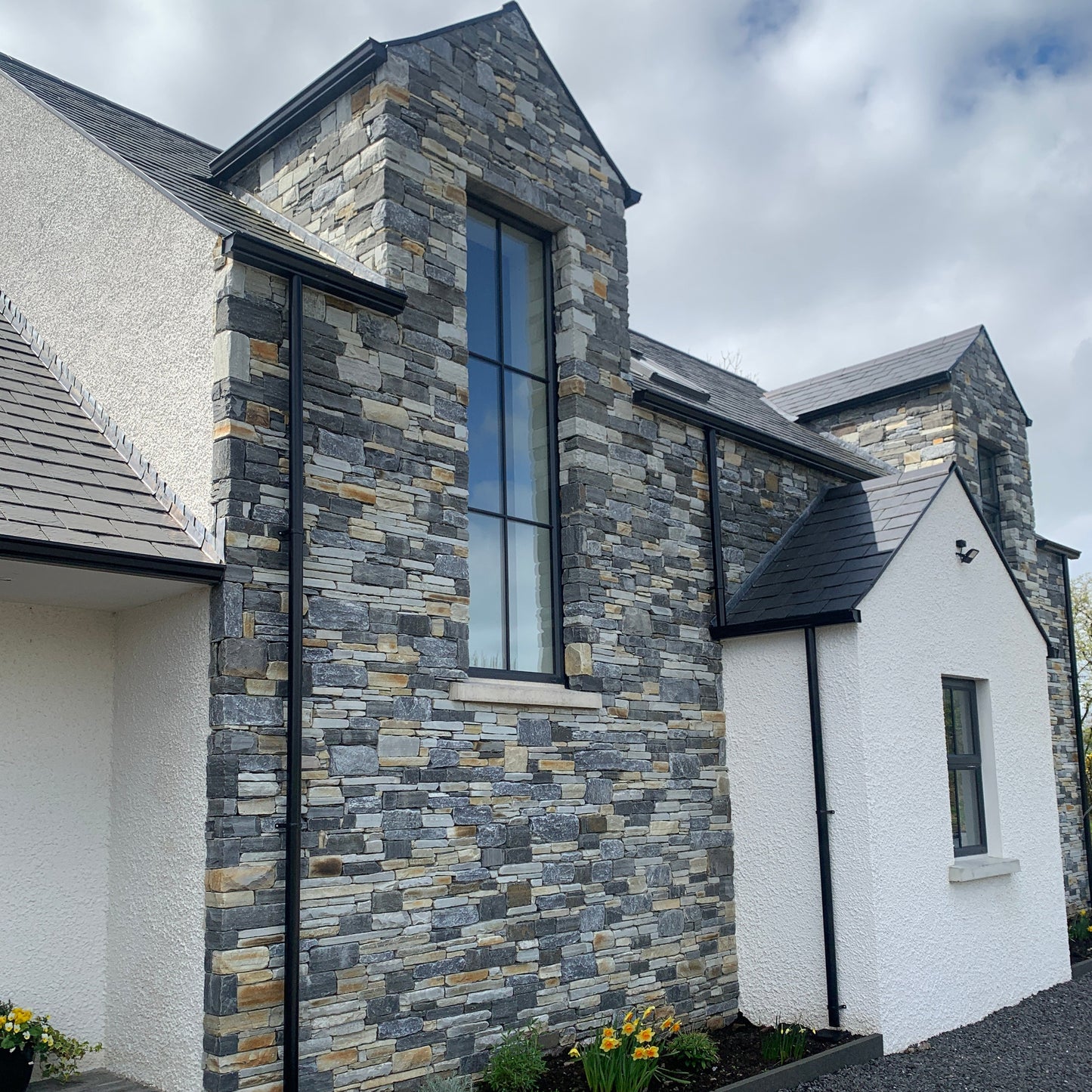 Modern new build completed using Highland Blend Tumbled walling stone. 