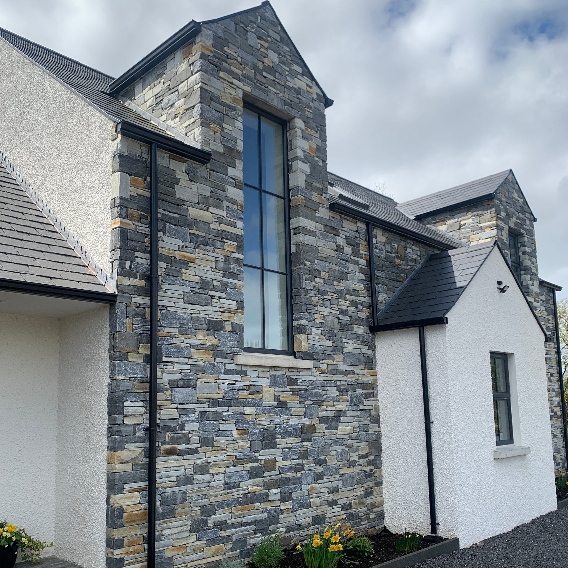Modern new build completed using Highland Blend Tumbled walling stone. 