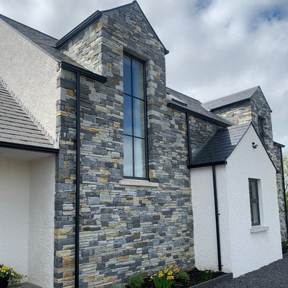 Modern new build completed using Highland Blend Tumbled walling stone. 