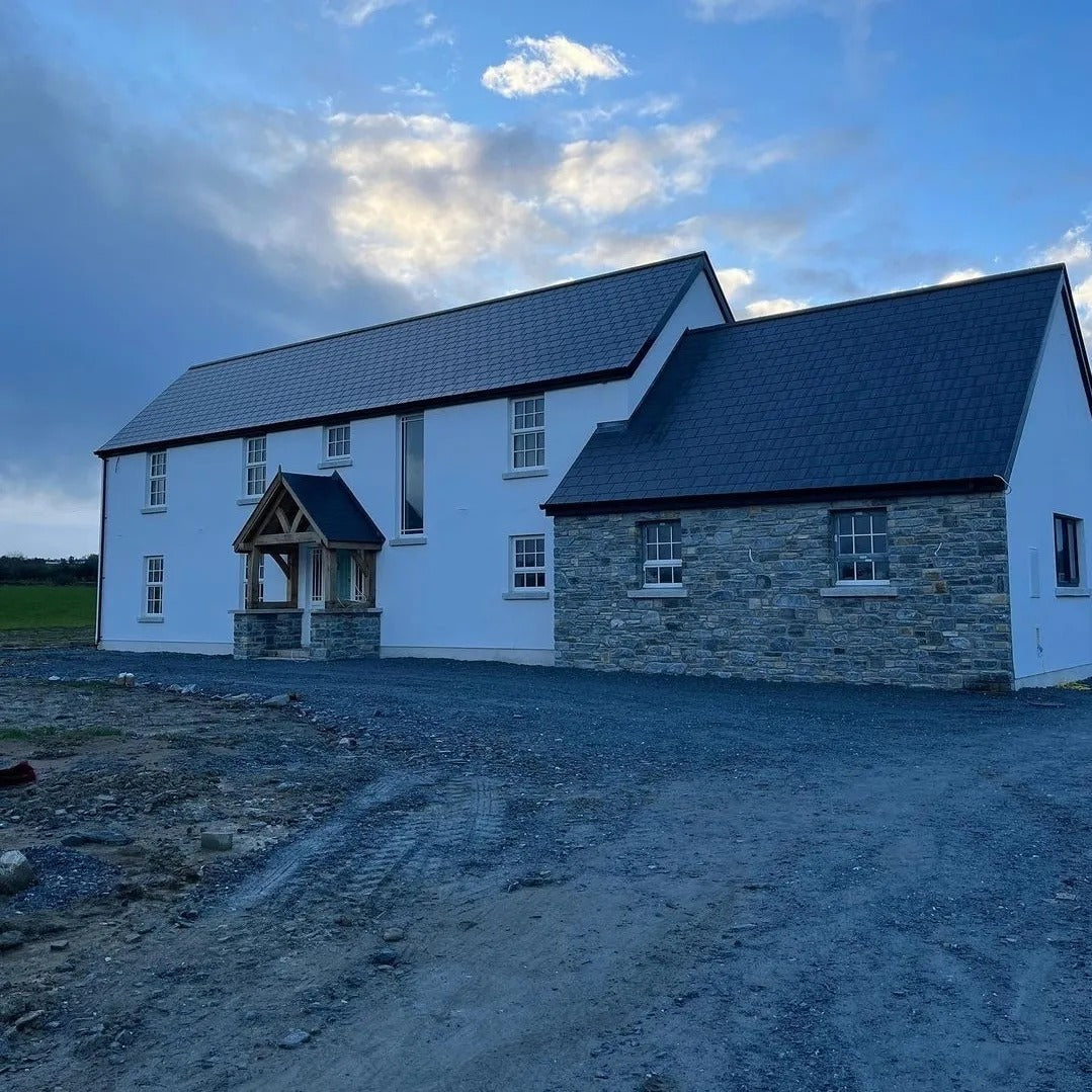 New build with stone façade in Highland Blend Tumbled. 