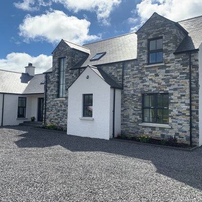 Modern new build completed using Highland Blend Tumbled 
