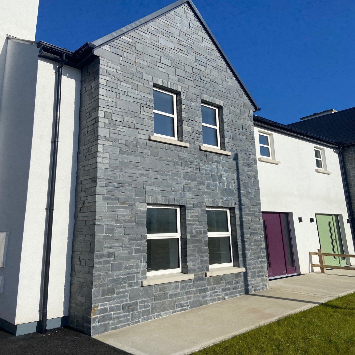 Residential estate with stone facades completed using Irish Slate Stoneer Cladding. 