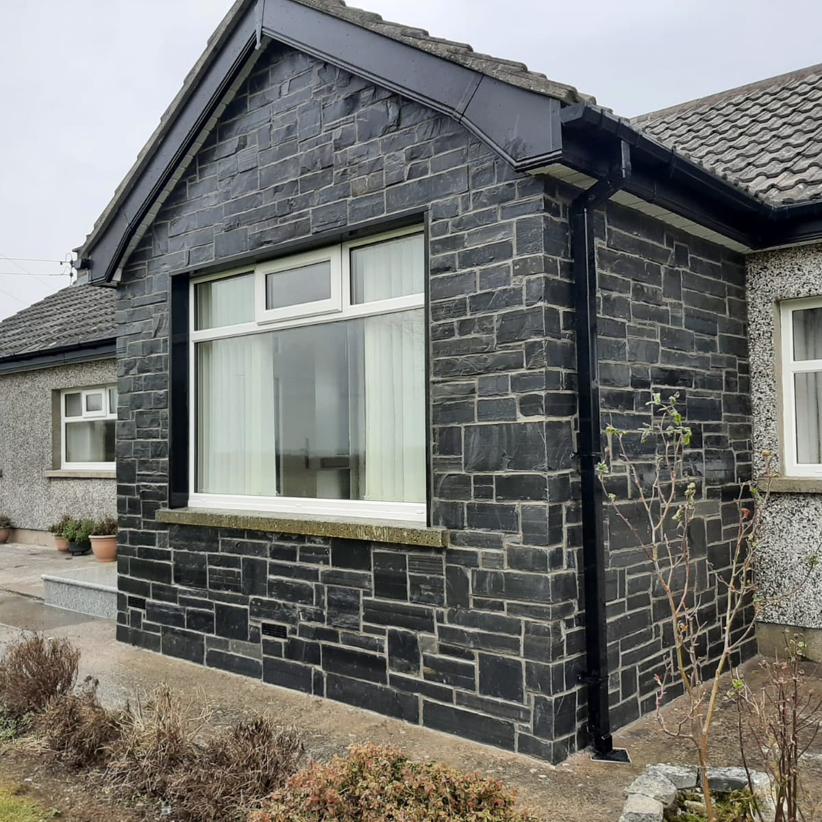 Stone porch completed using Irish Slate Stoneer Cladding. 