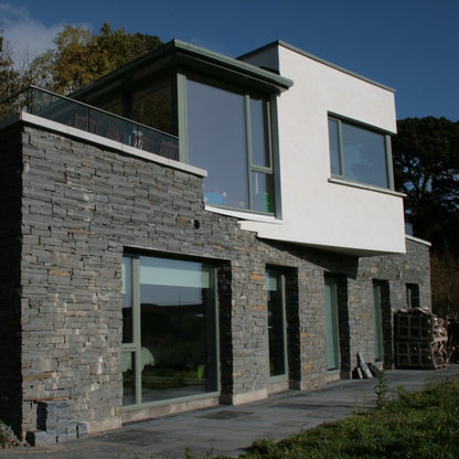 Contemporary home with external façade in a grey coloured stone called Liscannor Slate. 
