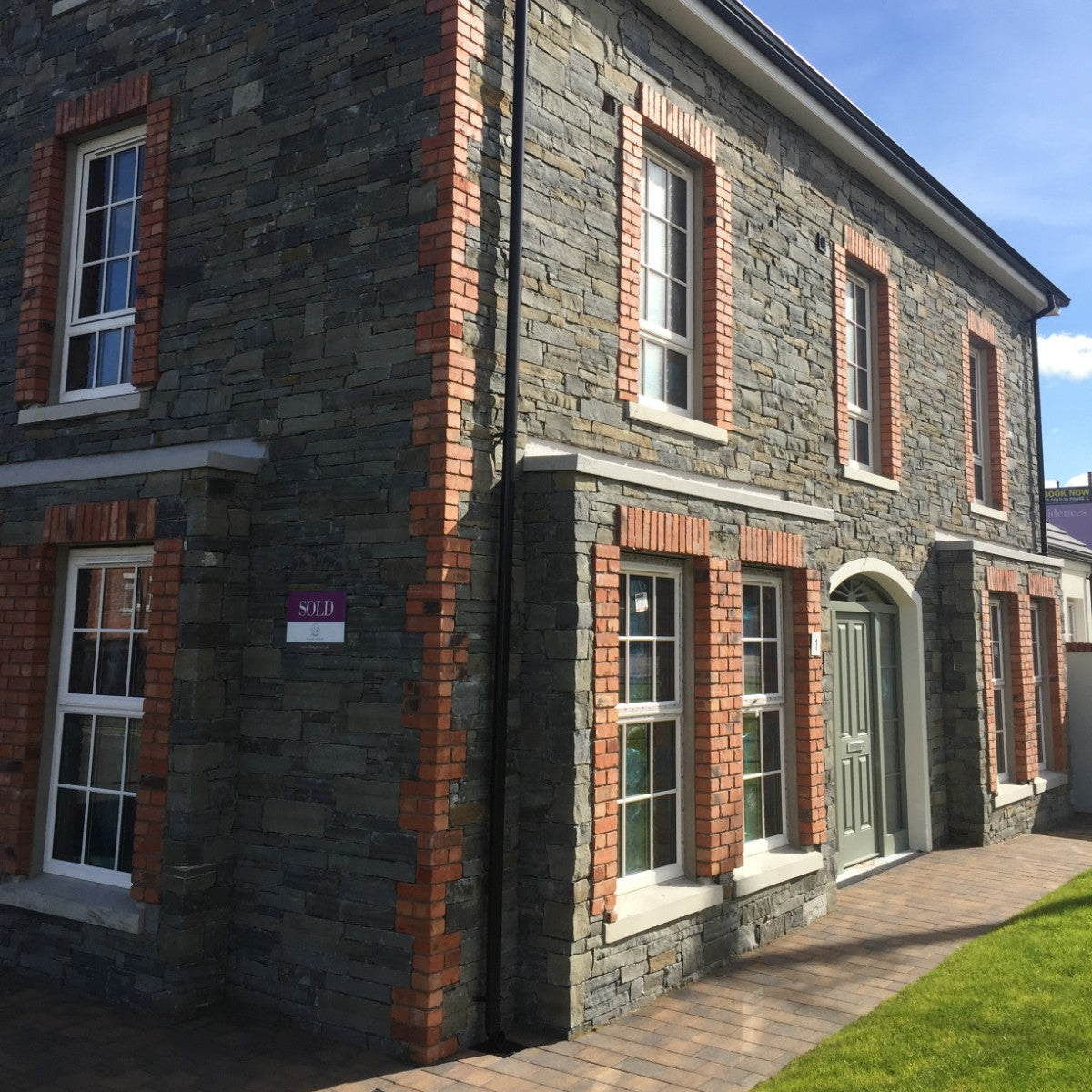 Two storey house completed in Liscannor Slate machined building stone.