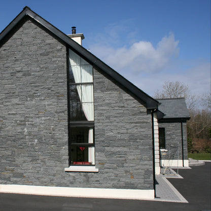 Stone façade completed in Liscannor Slate Stoneer Cladding.