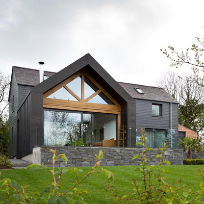 Raised patio wall cladded in Liscannor Slate Stoneer. 