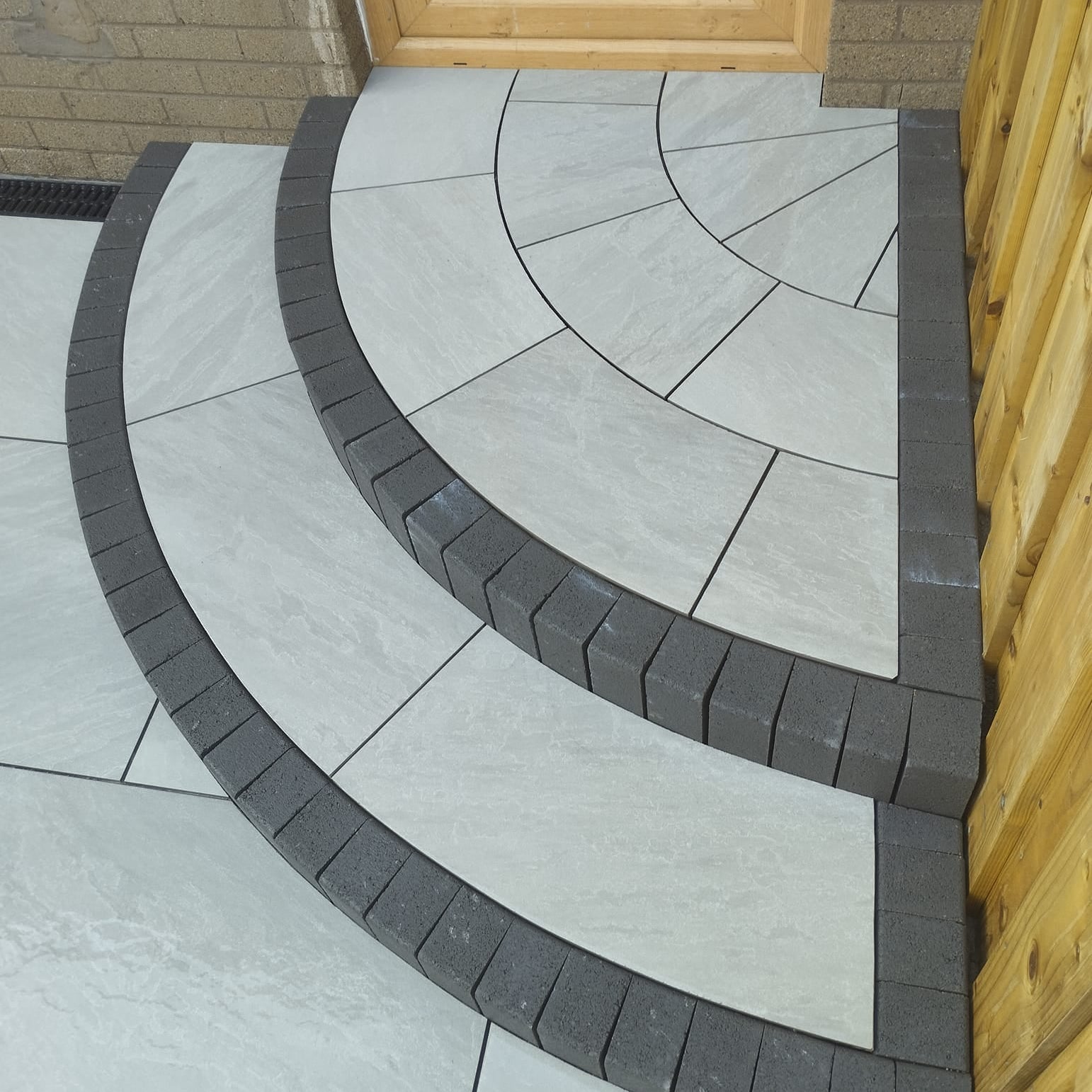 Step detail featuring Mercury Grey Jewel Range Porcelain Paving. 
