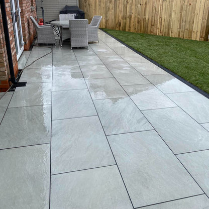 Patio area with Garden Table & Chairs. Paving is Mercury Grey Jewel Range Porcelain Paving Tiles.