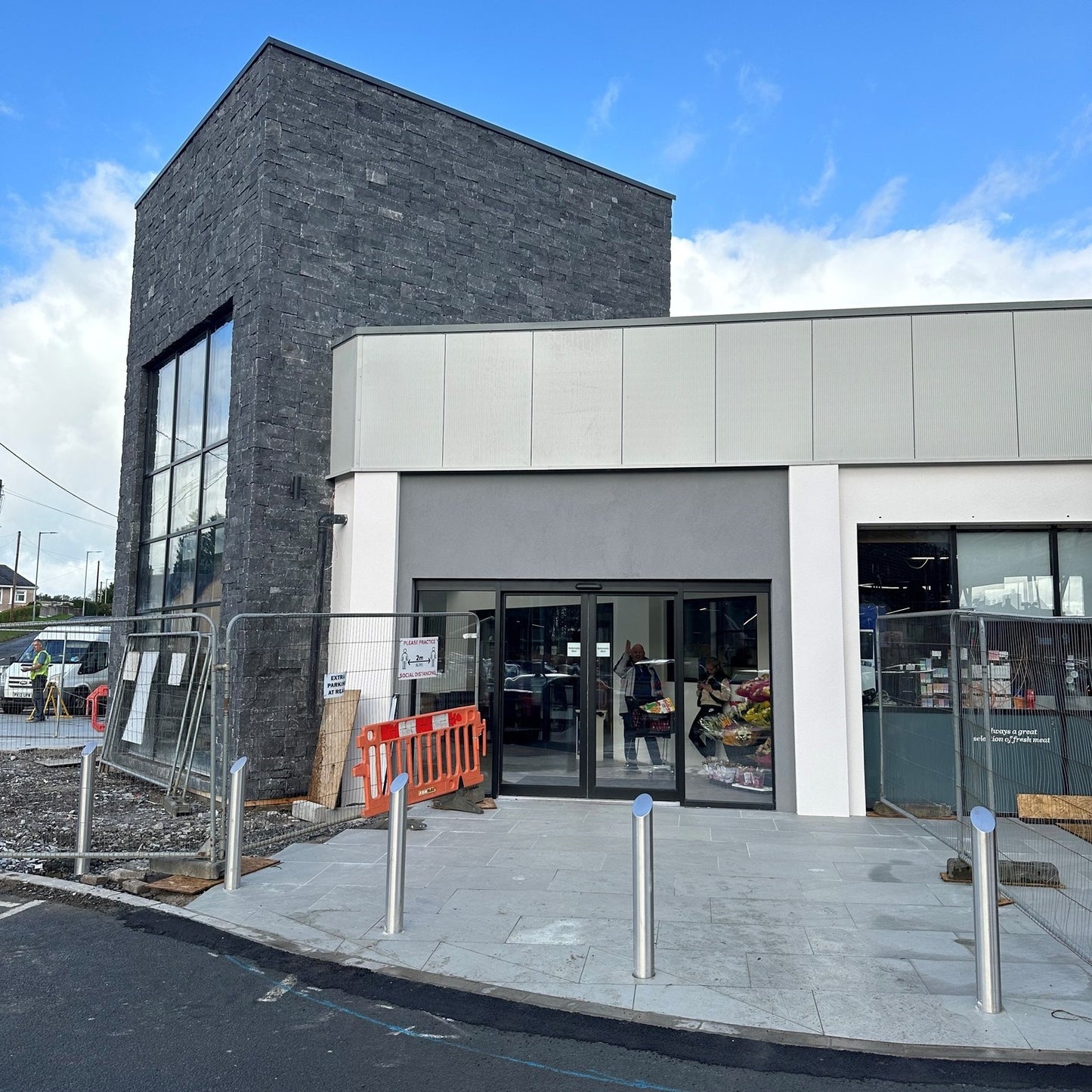 Commercial building with public paving outside completed using Mercury Grey Jewel Range Porcelain Paving. 