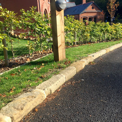 Driveway edging completed using Mountcharles Sandstone Kerbing. 