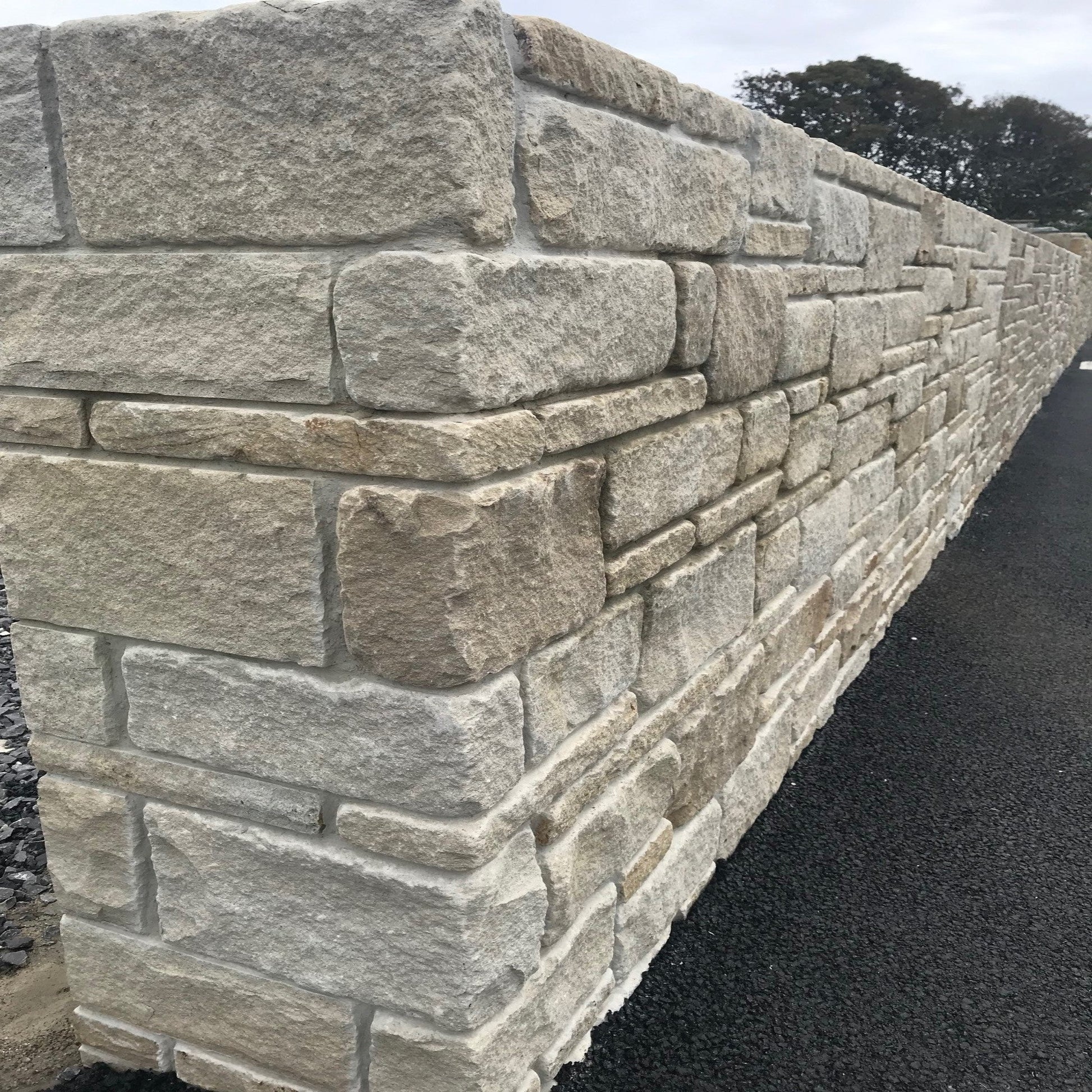 Display wall featuring our Mountcharles Sandstone Modular & Tumbled. 