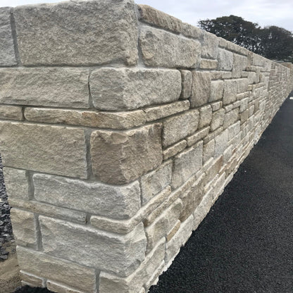Display wall featuring our Mountcharles Sandstone Modular & Tumbled. 