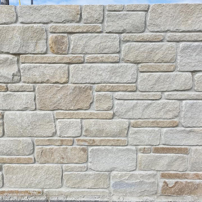Display wall featuring Mountcharles Sandstone Modular & Tumbled. 