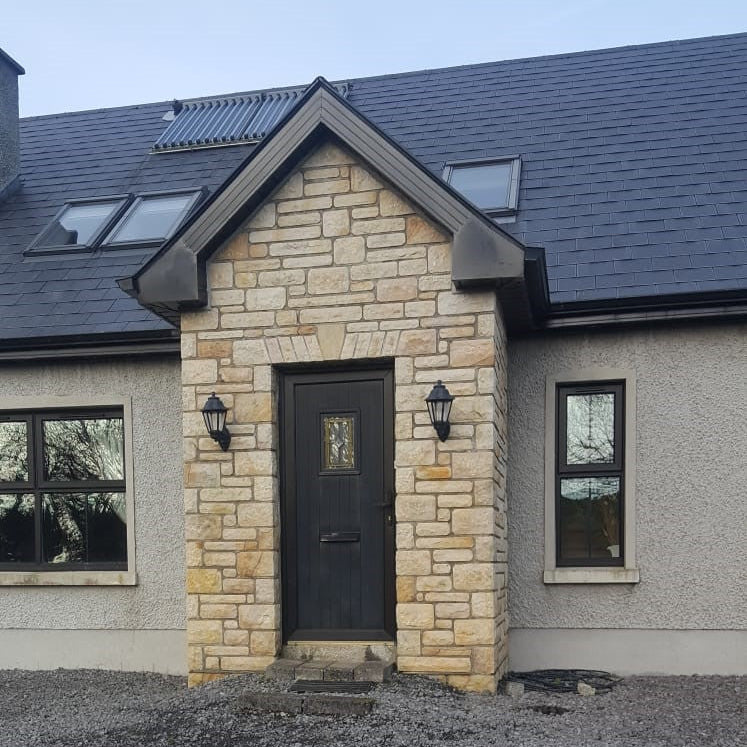 Front porch completed using Mountcharles Sandstone Modular & Tumbled. 