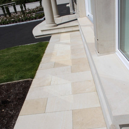 Stone pathway leading towards a house entrance. Stone is Mountcharles Sandstone. 