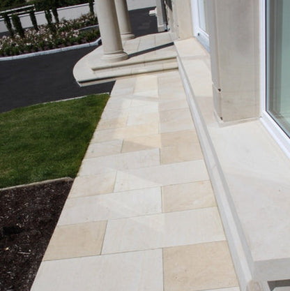 Stone pathway leading towards a house entrance. Stone is Mountcharles Sandstone. 