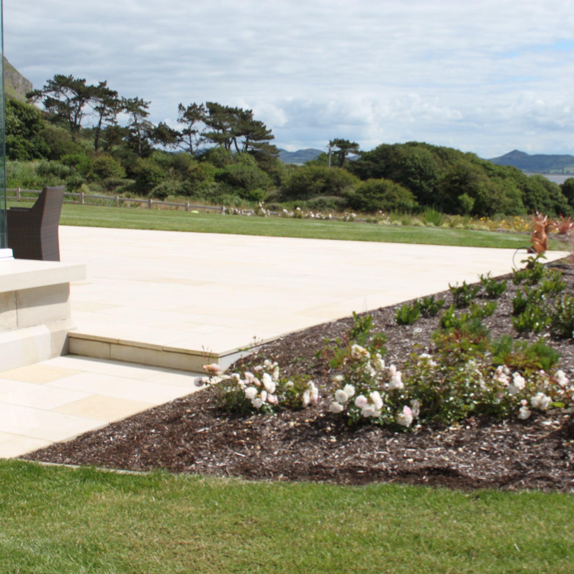 Beautiful patio area and garden. Paving slabs are Mountcharles Sandstone. 